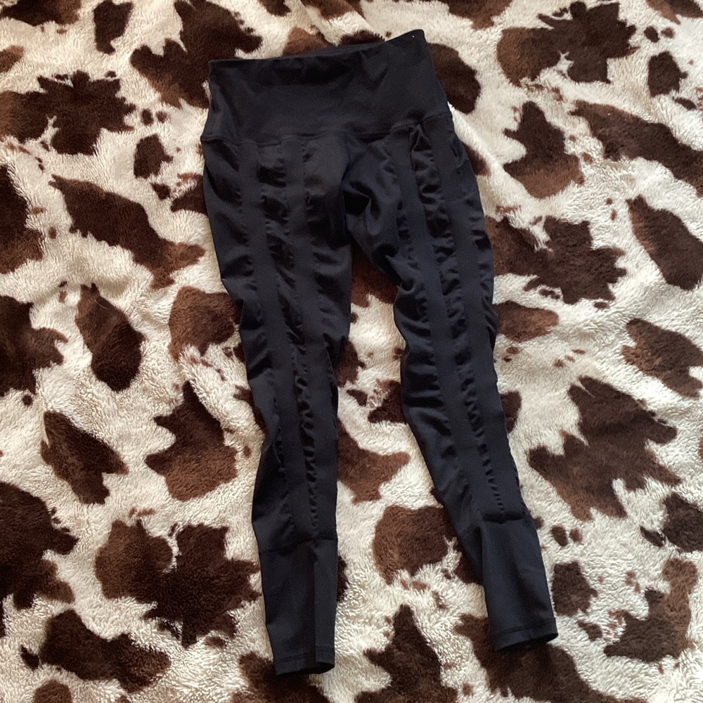 Elegant Black High-Waisted Leggings size 6. Never worn